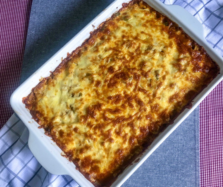 Image of Bake at 350° for 45 minutes until cheese is slightly golden brown and sides are oozing.