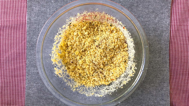 Image of Combine bread crumbs and melted butter.