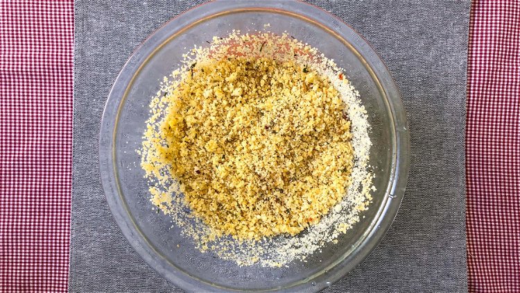 Image of Combine bread crumbs and melted butter.