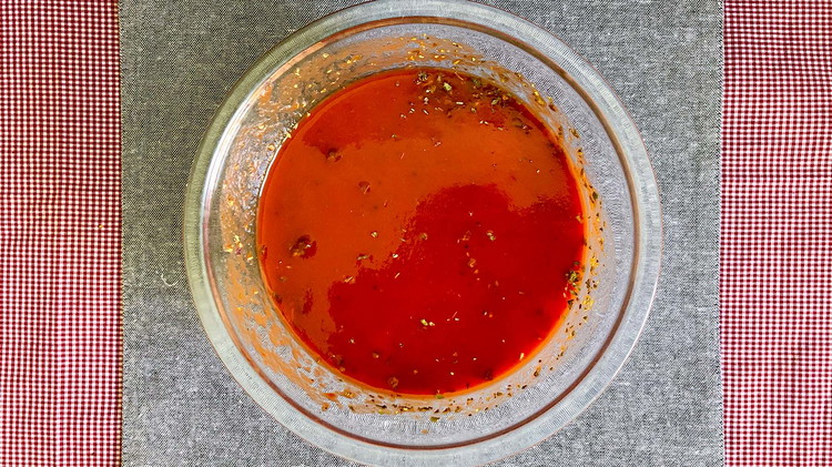Image of Mix tomato paste, tomato sauce, and Italian seasoning with 1 can of water.
