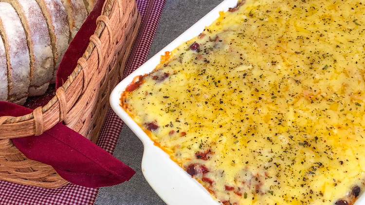 Image of Cover the dish with foil and bake for 45 minutes at 350° or until potatoes are tender. Remove foil and top with grated cheese and bake for 15 more minutes.
