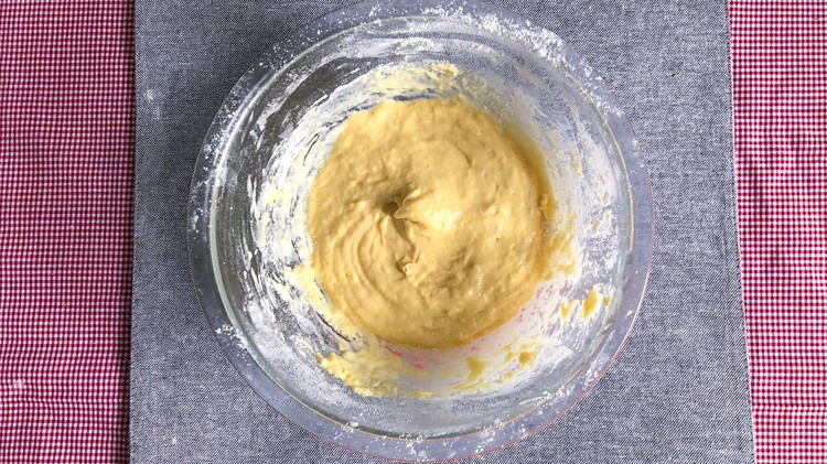 Image of Preheat the oven to 400°. Prepare dumpling batter by first mixing dry ingredients; flour, baking powder, and salt. In a separate bowl, whisk egg and milk. Combine wet and dry mixes to make dumpling batter. Set aside as this will...