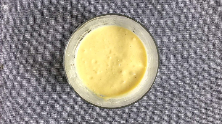 Image of In a small bowl, mix 3 tbsp flour with 1/2 cup of chicken broth. This will be used to thicken the sauce with the vegetable.