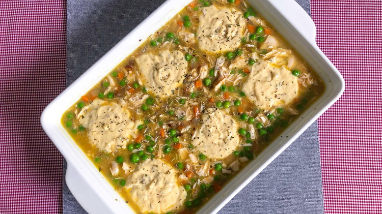 Image of Transfer chicken and vegetable mixture to a 9x13in greased casserole pan. Spoon the dumpling mix on top of the casserole (adjust the dumpling size to your preference). Season with salt and pepper.