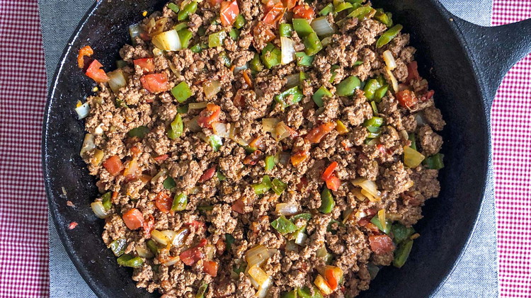 Image of First, saute onions with beef with half of the taco seasoning. Set aside. Cook pepper and tomato until tender with taco seasoning. Combine both mixtures.