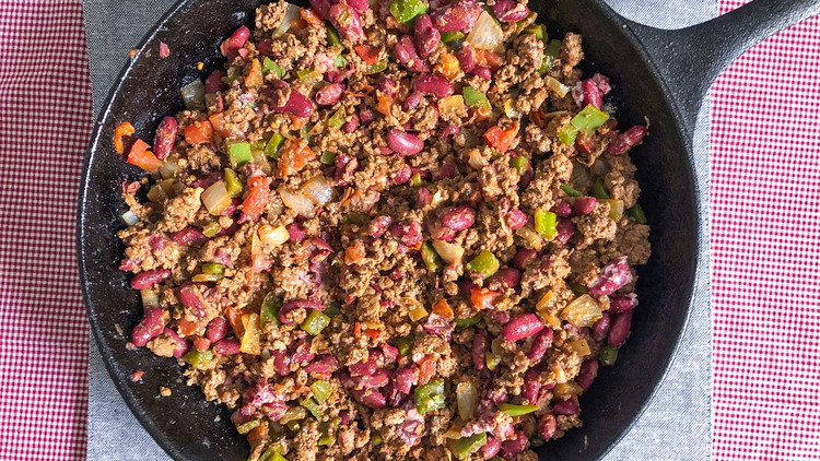 Image of Add the beans and brown sugar. Cook for 2-3 minutes. Add more taco seasoning to taste.