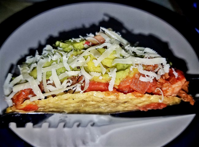 Image of Tamales de frijoles (corn masa filled with beans and wrapped in banana leaves)