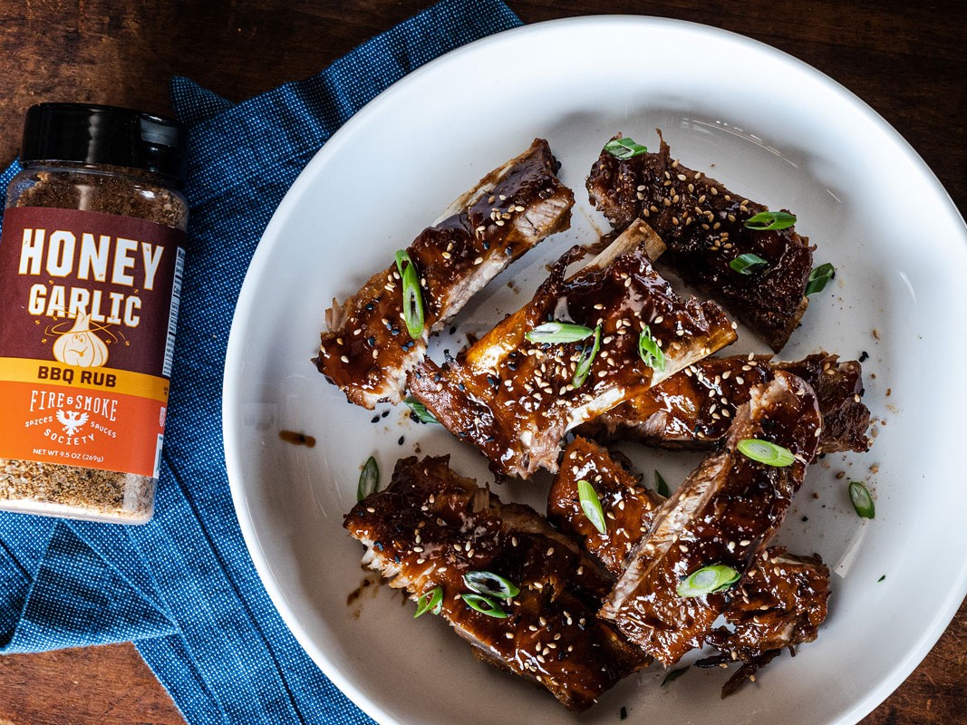 https://images.getrecipekit.com/20230407135438-honey-garlic-ribs-with-hoisin-glaze-by-fire-and-smoke-society.jpg?aspect_ratio=4:3&quality=90&