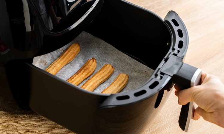 Image of Cook at 330 degrees F for about 10 minutes, or until dough is cooked through.  Repeat the process with remaining dough. 