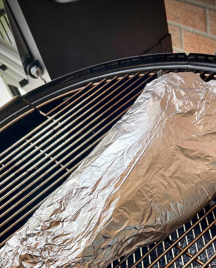 Image of wrap brisket tightly in 3 layers of foil, then back into the cooker to steam. Once internal reaches 205F/96C you’re done