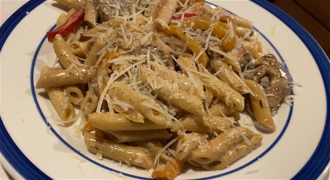 Image of Jerk Chicken and pasta in a spicy Cream Sauce