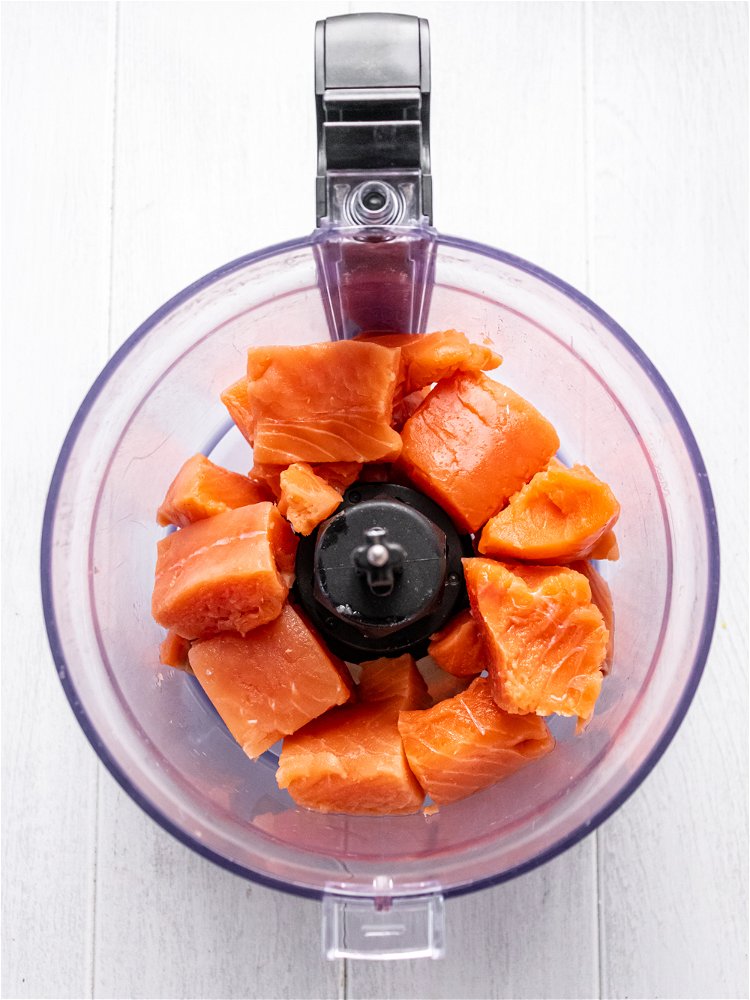 Image of Slice off skin from salmon and place in food processor....