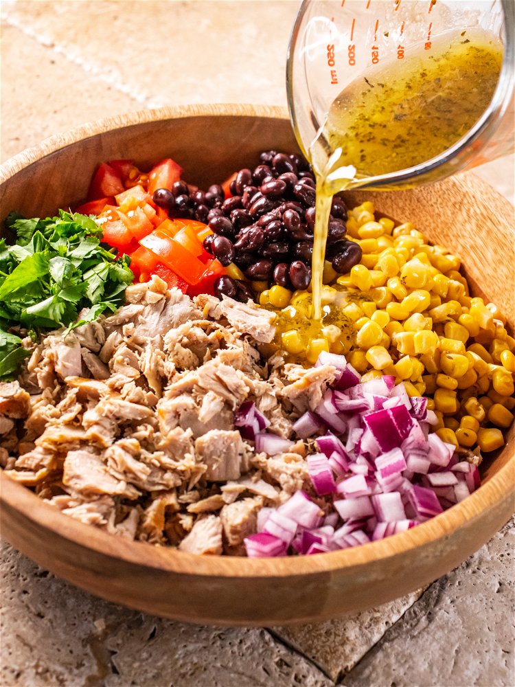 Image of Combine chilled tuna, corn, black beans, tomato, red onion and...