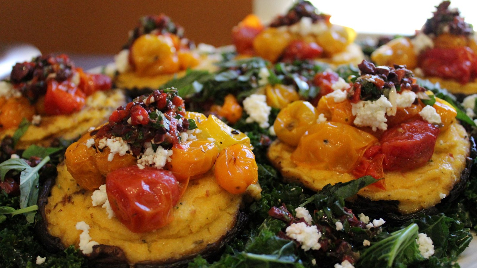 Image of Rosemary Polenta Stuffed Portobello Mushrooms With Smoked Tomatoes