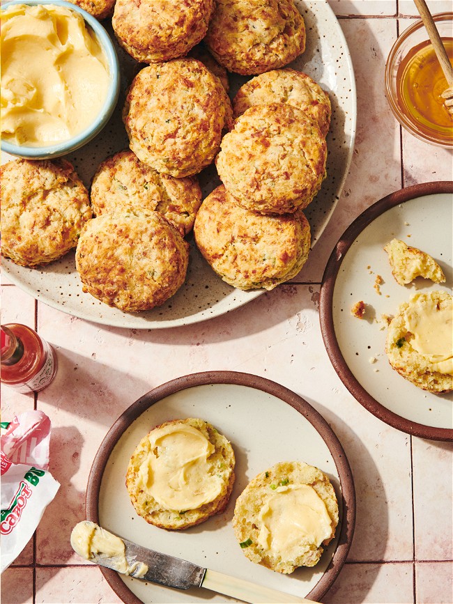 Image of Prosciutto, Cheddar & Chive Biscuits with Hot Honey Butter 