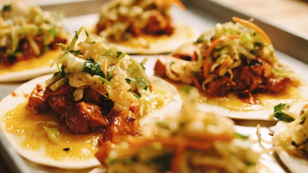 Image of Buffalo Chicken Tacos with Cilantro Lime Slaw