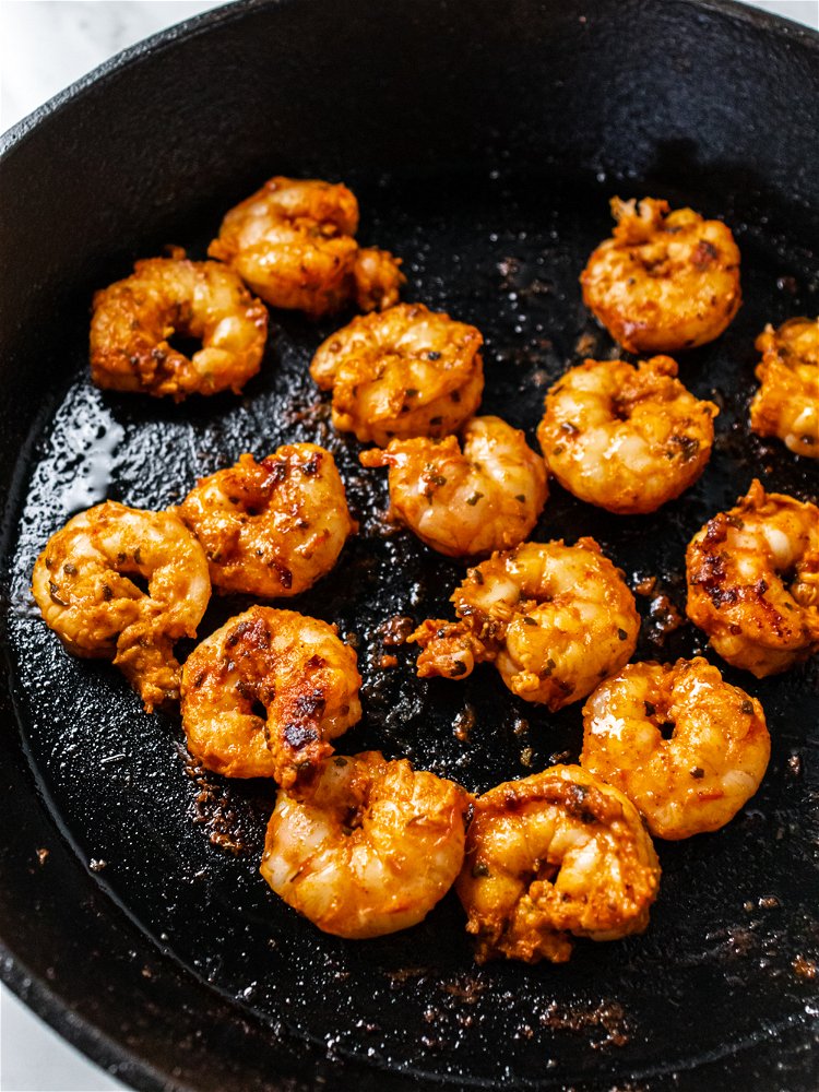Image of Add shrimp to hot skillet and cook for 5-6 minutes,...
