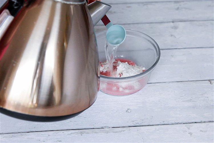 Image of Boil a kettle. Empty the sachet of macaron mix into...