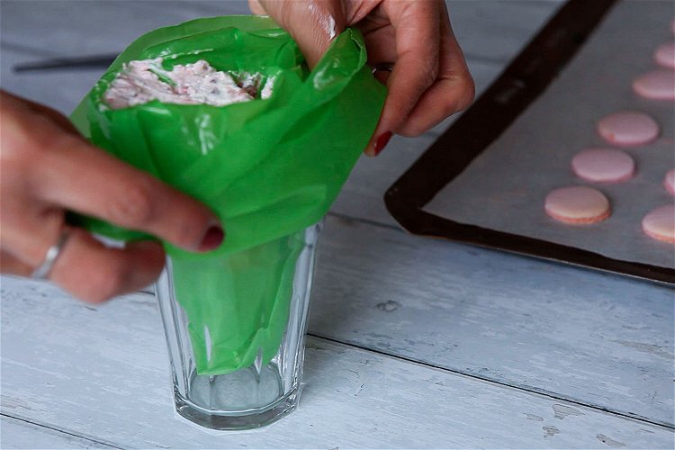 Image of Prepare piping bag as before and spoon in the raspberry...