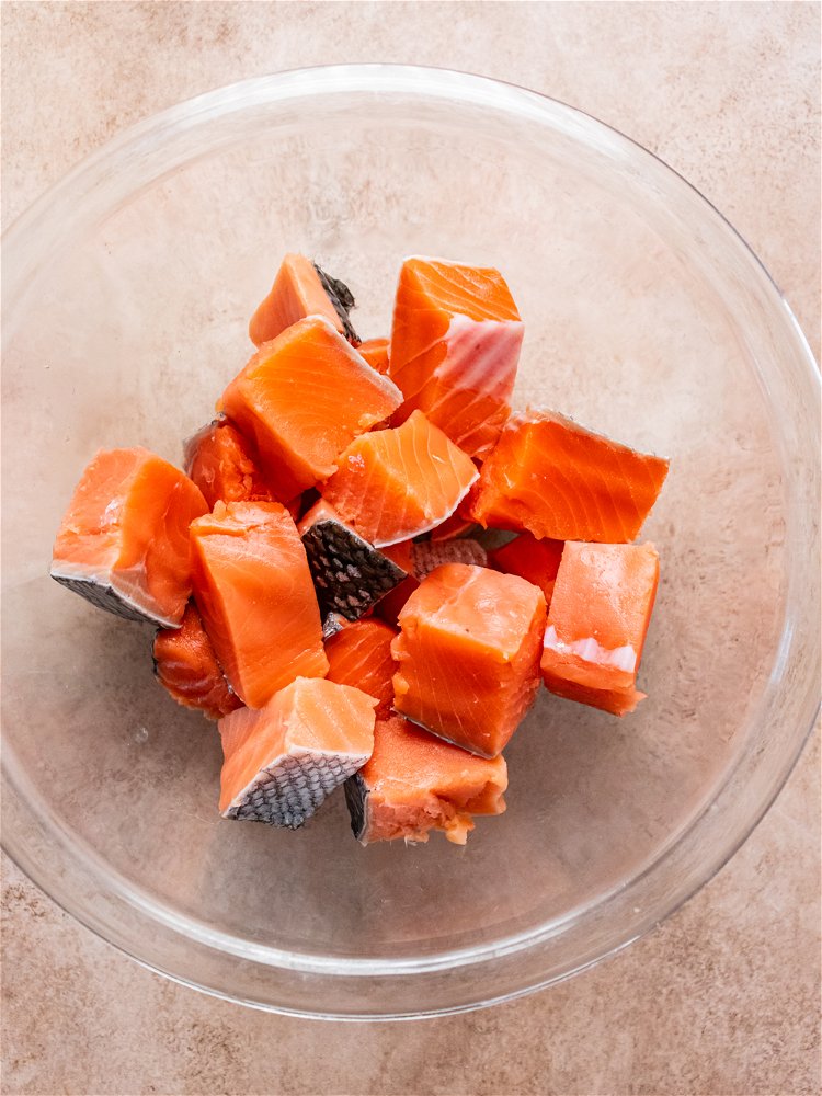 Image of Slice salmon into bite sized pieces. Add to a medium...