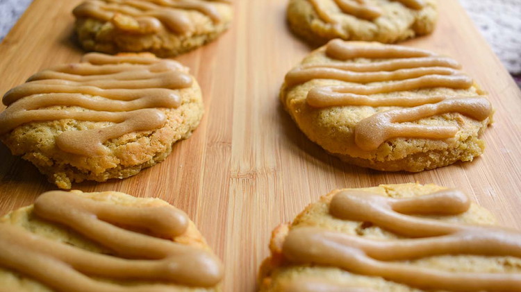 Image of For caramel icing: Add milk and bring it to a boil. Let cool and add powdered sugar. Let the icing cool then frost with cookies.