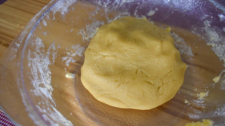 Image of Add dry ingredients. You should be able to form a ball of dough.
