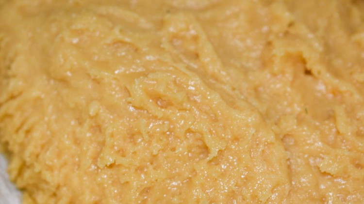 Image of In a separate bowl combine flour, cream of tartar, baking soda, and salt. Stir the flour mixture into the butter mixture until the dough holds together.