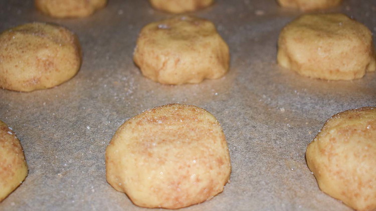 Image of Mix the topping ingredients (cinnamon and sugar) in a separate bowl. Roll 2 tablespoon-sized balls in cinnamon and sugar mixture. Place 2 inches apart on a lightly greased baking sheet or parchment paper. Bake for 7 minutes in a 400°...