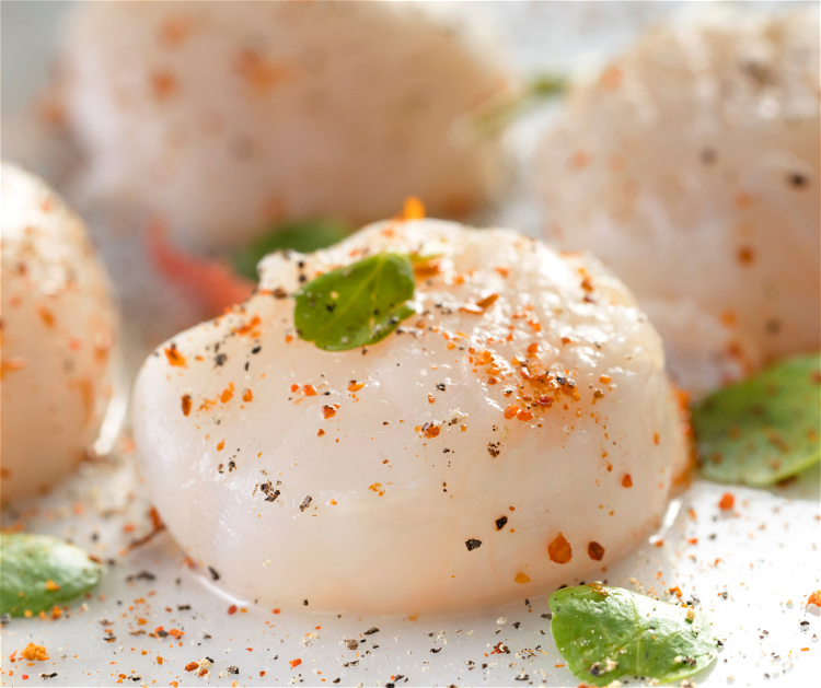 Image of Thoroughly dry the sea scallops and then place them on...
