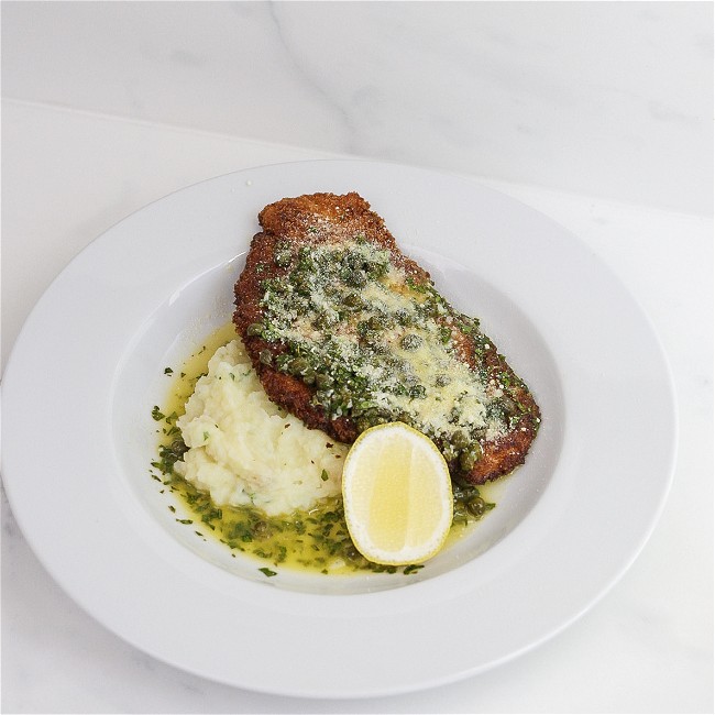 Image of Chicken schnitzel with lemon and caper butter sauce