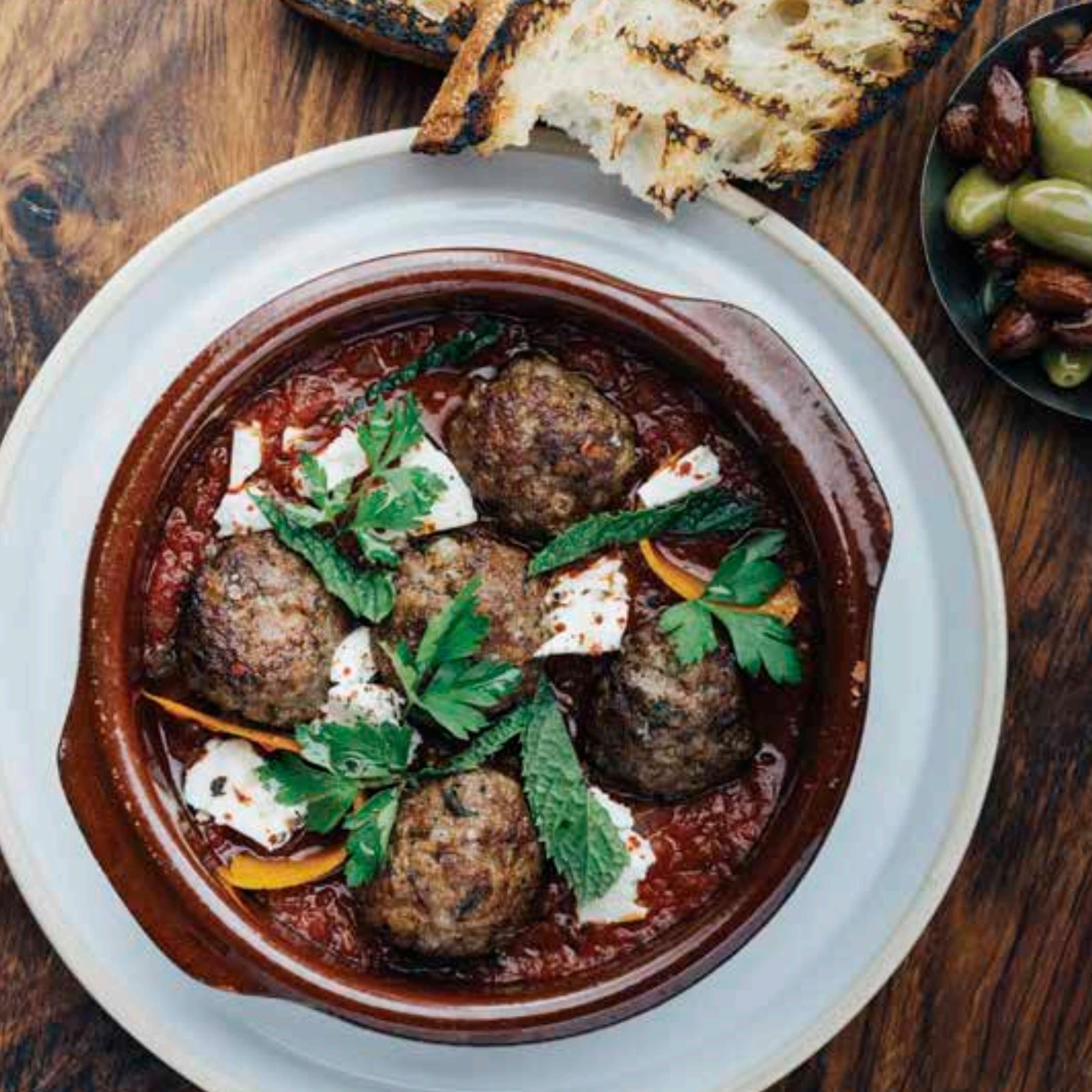 Image of Lamb Meatballs, Spiced Tomato Sauce, Mint, and Feta