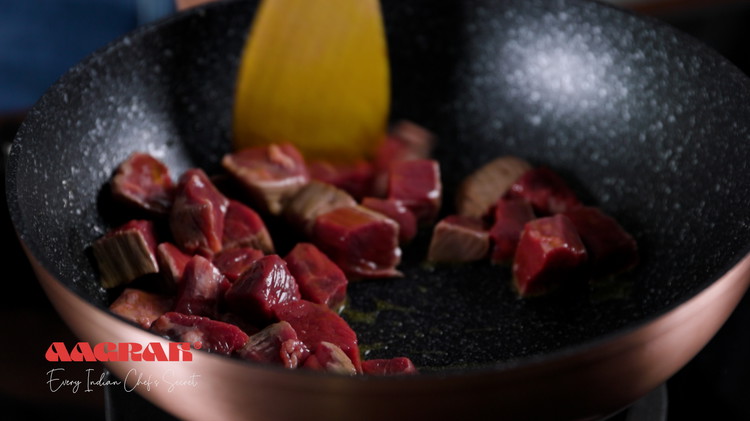 Image of Add 200-250ml water to the pan. Bring to the boil and simmer on a low heat for 20 minutes