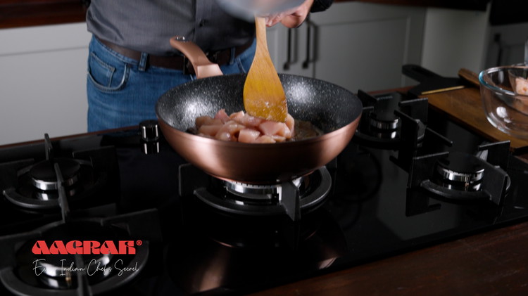 Image of Add the chicken to the pan and cook for 2-3 minutes