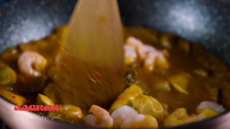 Image of Add the king prawns and cook for a further 3-4 minutes. If the dish is watery, just simmer for a few more minutes until the sauce thickens and reaches the desired consistency.