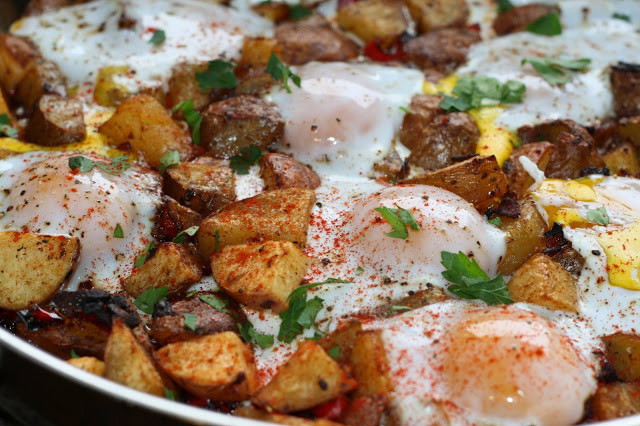 Potato, Caramelized Onion, & Roasted Red Pepper Hash with Baked eggs & Olive Oil