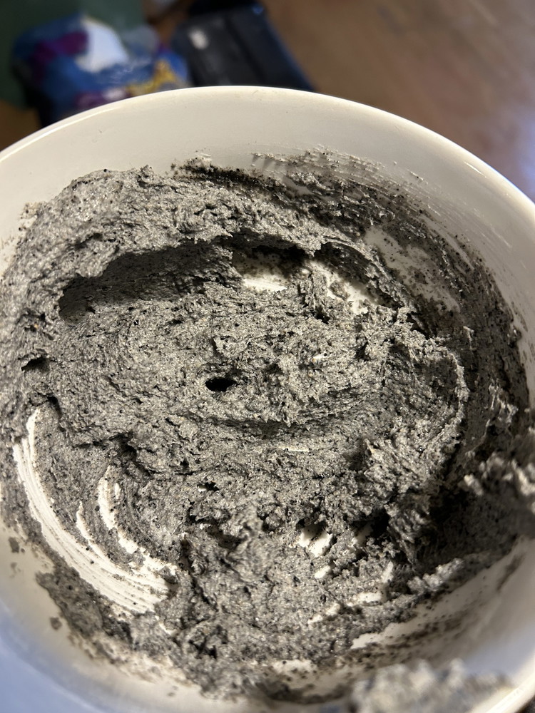 Image of While the curd sets, make the black sesame frosting by, mixing together the cream cheese, black sesame crunchy butter, and powdered sugar in a bowl. Sweeten or add Black Sesame Crunchy Butter to taste. Set aside.