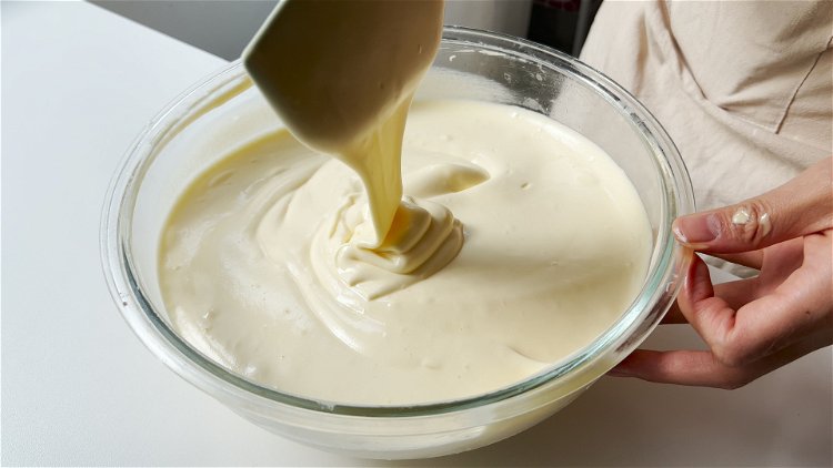 Image of Take a scoop of whipped egg white to fold into...