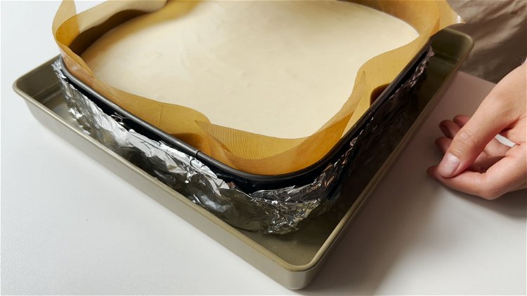 Image of Wrap the baking pan bottom with tinfoil to avoid water...