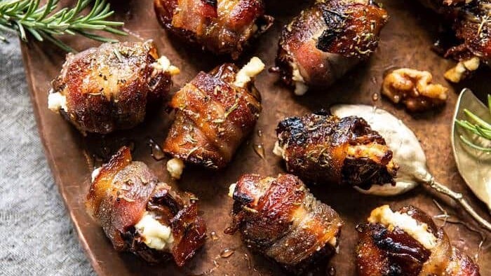 Image of Bacon Wrapped Dates -- Stuffed Goat Cheese topped with Black Mission Fig Reduction