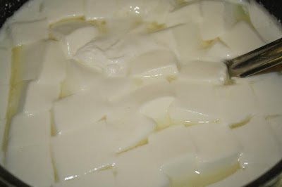 Image of Allow the curds to sit undisturbed for 15 minutes until...
