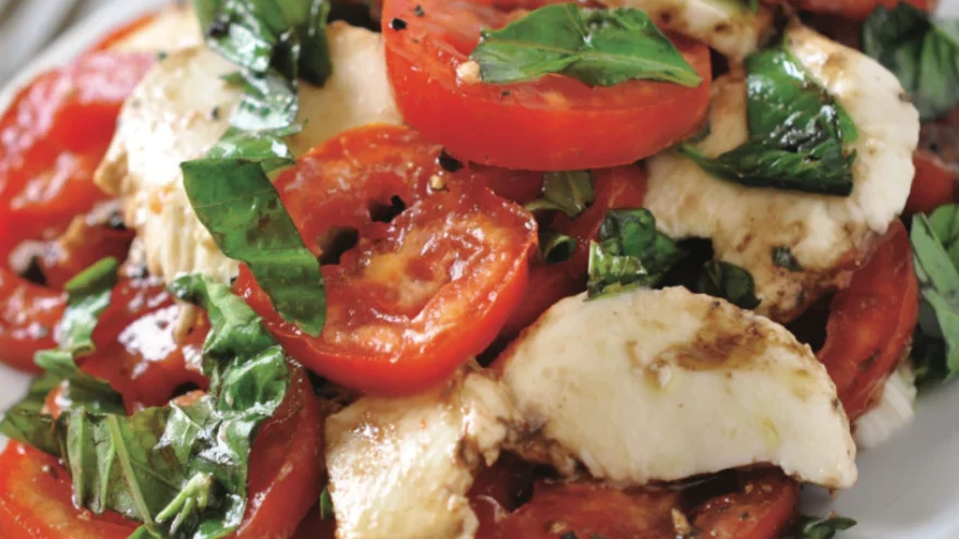Image of Mozzarella Fresca Salad with Torn Basil and Heirloom Tomato