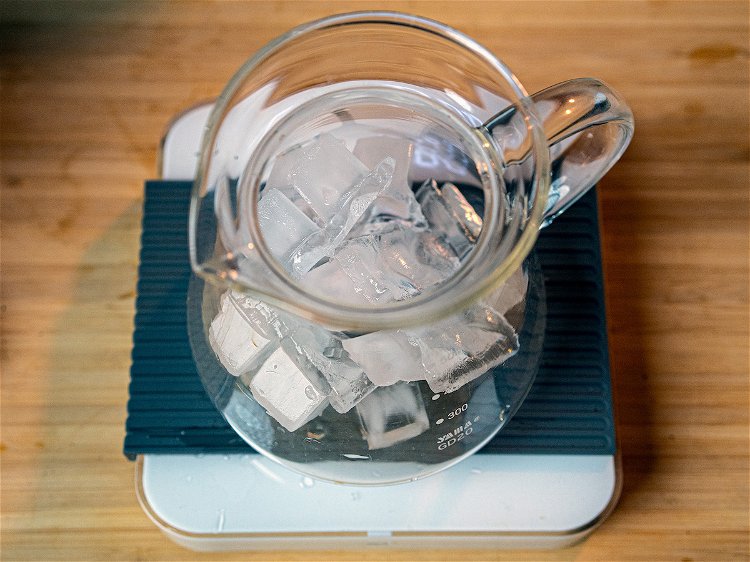 Image of Weigh out 150 grams of ice and place into your...