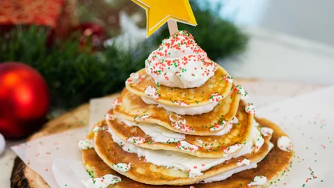 Image Of Green Pancake Shaped As Christmas Tree Cooking In Nonstick Frying  Pan For Childrens Breakfast On Xmas Day Christmas Tree Pancakes Ready To Be  Decorated With Fruit Baubles And Star Shaped