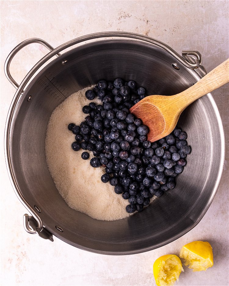 Image of Add all the ingredients to a large saucepan over a...