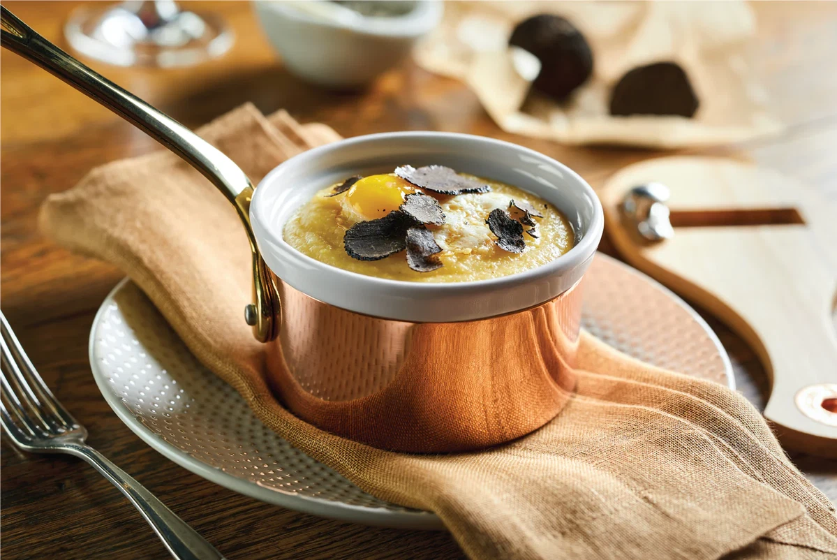 Polenta with quail eggs and truffle