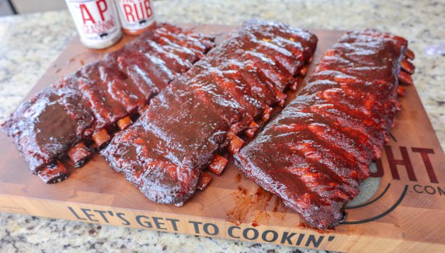 Image of Carefully remove each slab of ribs from the foil wrap...