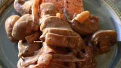 Image of Fresh Wild Salmon with Creamy Balsamic Rosemary-Carmelized Onions and Wild Mushrooms