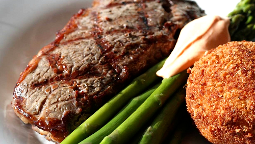 Image of Steak - New York Strip marinated with Smoked Olive Wood Olive Oil
