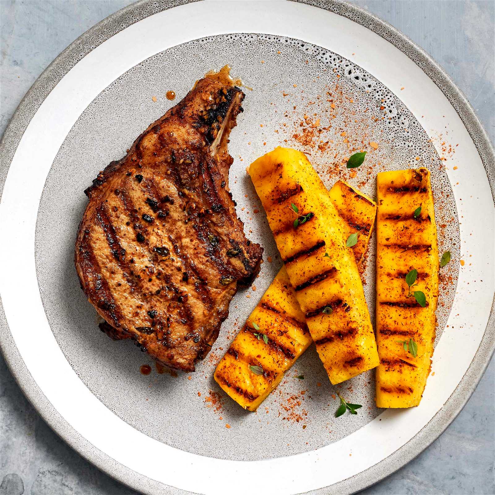 Image of GRILLED BERKSHIRE PORK CHOP WITH PINEAPPLE