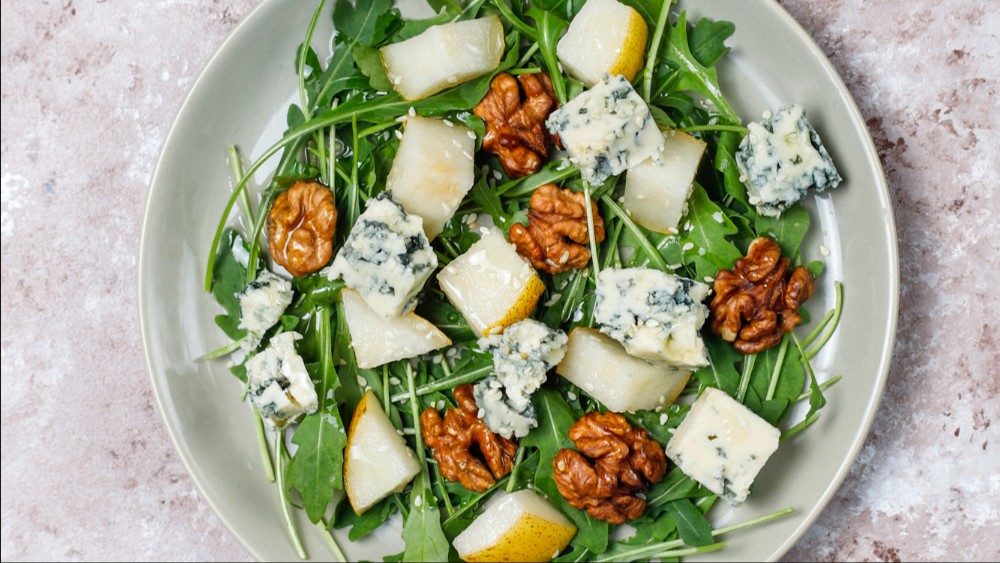 Image of Rocket salad with dairy-free blue cheese and walnuts 